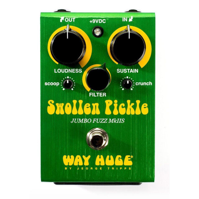 Green fuzz effects pedal front panel with two large knobs, filter knob, and input/output