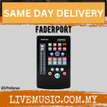 Black front panel fader controller with illuminated button grid and rotary control