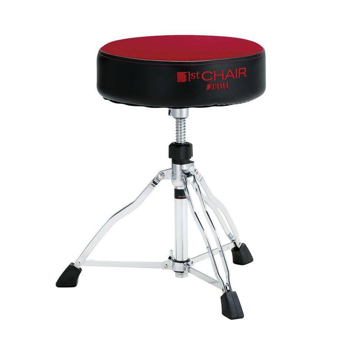 Dark red round drum throne seat with chrome tripod legs and black foot pads