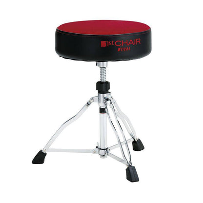 Dark red round drum throne seat with chrome tripod legs and black foot pads